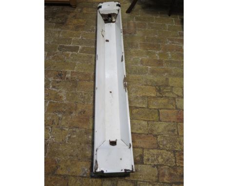 A 1940's vintage REVO green and white vitreous enamel fluorescent strip light, salvaged from a former WWII Lancaster bomber A