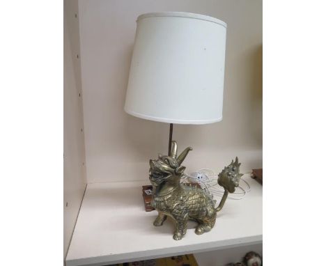 A table lamp in the form of a dragon 