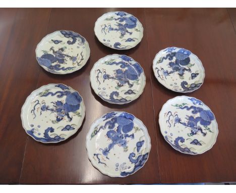 Seven oriental lily pad leaf shaped plates with blue dragon and pearl decoration, 6 character mark to each - Diameter 22cm - 