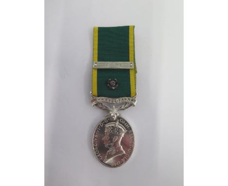 A George VI Territorial medal with bar and rose to 2568769 C.Q.M Sjt K G Stacey R Signals