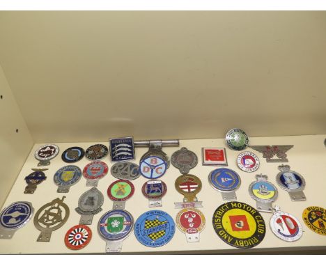 A collection of 30 motoring/car badges including a 1933 Norman Cross Motor Club badge - enamel chipped 