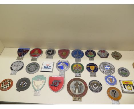 A collection of 25 motoring/car badges including a Royal Automobile Club Associate badge with enamel centre (chipped) 