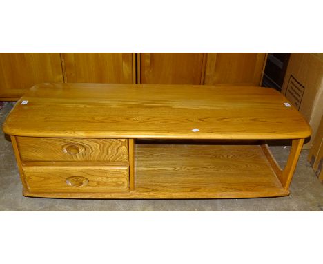 A modern Ercol light elm two-tier coffee table, the rectangular top with rounded corners, fitted with two drawers, 124 x 53cm