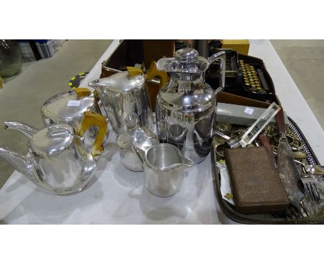 A five-piece picquot ware tea service, a model 29a Thermos flask and a small collection of plated ware. 