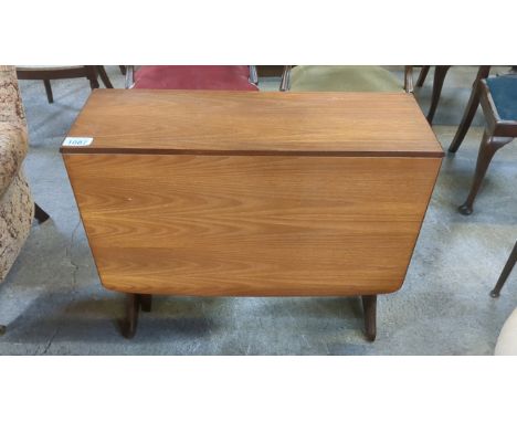  Sale Item:    G PLAN STYLE DROP LEAF TABLE   Vat Status:   No Vat   Buyers Premium:  This lot is subject to a Buyers Premium