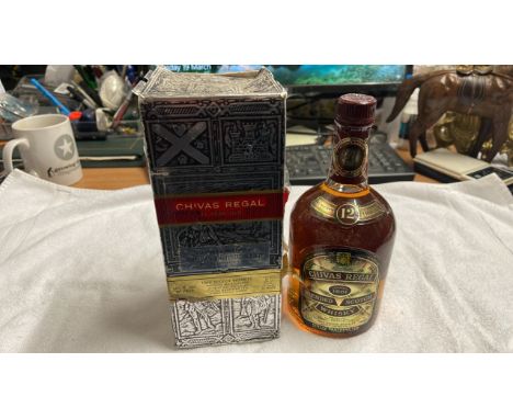  Sale Item:    12 Y O CHIVAS REGAL 26.67FL OZS 75 PROOF  Vat Status:   No Vat   Buyers Premium:  This lot is subject to a Buy