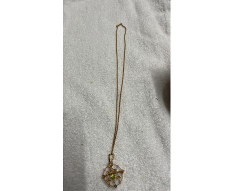  Sale Item:    PERIDOT &amp; SEED PEARL PENDANT &amp; CHAIN  Vat Status:   No Vat   Buyers Premium:  This lot is subject to a