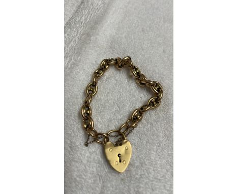 Sale Item:    ROLLED GOLD BRACELET WITH 9CT GOLD LOCK  Vat Status:   No Vat   Buyers Premium:  This lot is subject to a Buye