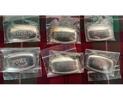  Sale Item:    6 SILVER PLATED BOTTLE LABELS   Vat Status:   No Vat   Buyers Premium:  This lot is subject to a Buyers Premiu