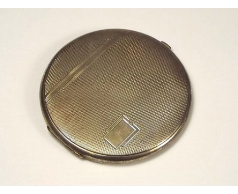 POWDER COMPACT.
An Art Deco silver powder compact.