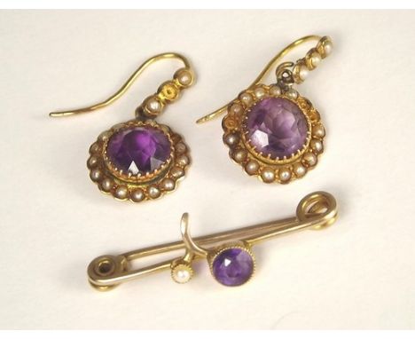 BAR BROOCH ETC.
A small amethyst & half pearl bar brooch & a pair of yellow metal earrings, set with amethyst & half pearls.