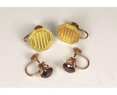 GOLD EARRINGS.
A pair of 18ct. gold engine turned cufflink earrings, with 9ct. gold screw mounts & one other pair of stone se