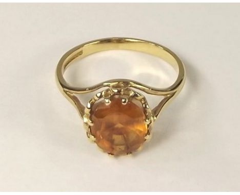 DRESS RING. 
A 9ct. gold dress ring. 