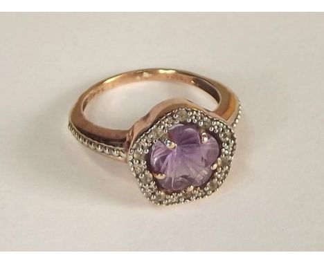 SILVER & AMETHYST RING.
A gold plated silver, amethyst & white topaz ring.