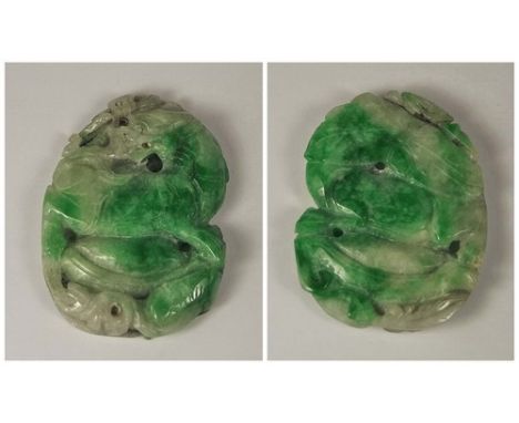 JADE CARVING.
A 19th century Chinese mottled, emerald & pale green jade carving, with a dragon & lotus plants.
4.5 x 6cm.