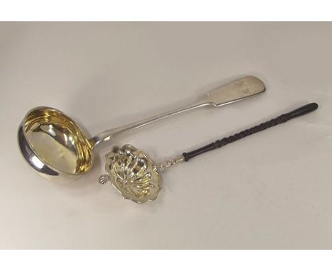 RUSSIAN LADLES.
A Russian silver fiddle pattern soup ladle, with silver gilt bowl, stamped 84 Kokoshnik mark, 8 1/2oz & a Rus