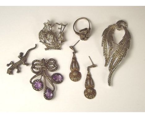 MARCASITE.
A silver, marcasite & amethyst brooch & other marcasite set jewellery.