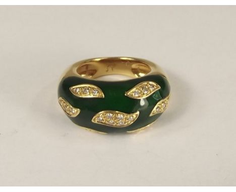 GOLD RING.
An 18ct. gold, green enamelled ring with seven panels of 21 pave set diamonds. Approx. 13.9g. Size M.