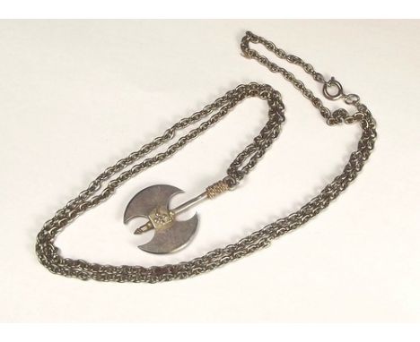 SILVER PENDANT.
A vintage silver, double headed axe pendant (probably Scandinavian or Icelandic) & chain. Drop 3.5cm.