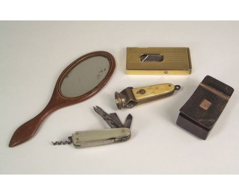 SNUFF BOX ETC.
A Georgian gold mounted pressed tortoiseshell snuff box, (corner repaired), two cigar cutters, a miniature han