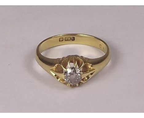 SOLITAIRE RING. 
An 18ct. gold solitaire diamond ring, the cushion shape stone approx. 0.60ct. spread. Size Q.