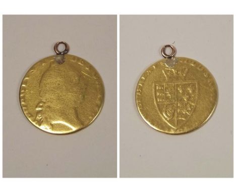 GEORGE III GUINEA.
A George III spade coin, worn & with applied ring.
8.1g.
