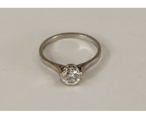 SOLITAIRE RING.
An 18ct. white gold solitaire diamond ring, the stone of approx. 0.60ct. spread. Size Q.