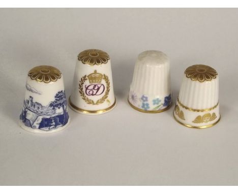 THIMBLES.
Four Spode bone china thimbles including 1981 Royal Wedding.