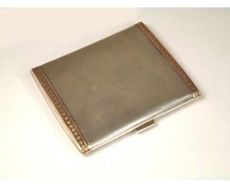 CIGARETTE CASE.
A lady's Art Deco silver & silver gilt cigarette case with original contents. Birmingham 1928.