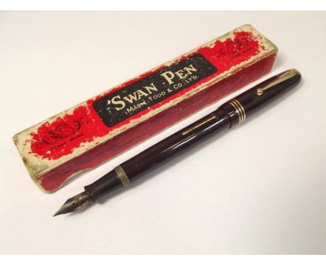 FOUNTAIN PEN.
A brown Mabie Todd, Swan Self-Filler fountain pen, with original box & leaflet.