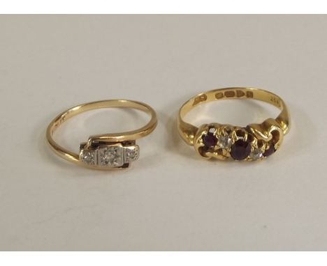 GOLD RINGS.
A gold & platinum illusion set diamond ring & an Edwardian 18ct. gold garnet & diamond ring.