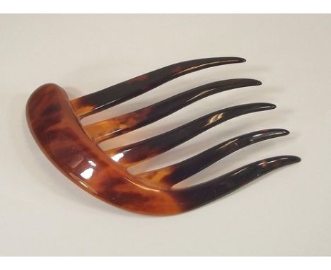 HAIR COMB.
An Art nouveau tortoiseshell hair comb.