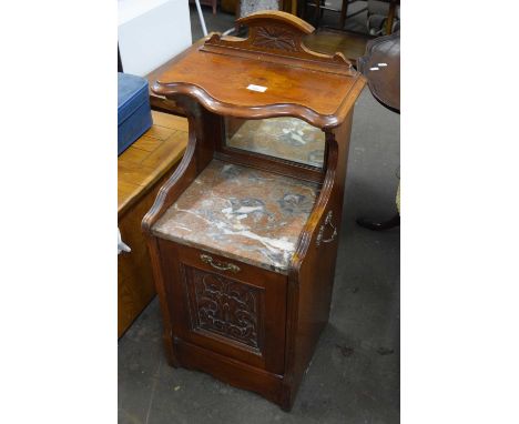 An Edwardian coal skuttle with mirror back and marble top and shelf 
