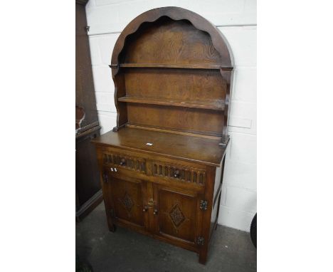 Sideboard with arched shelf above
