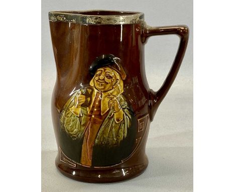 ROYAL DOULTON ALE JUG BY NOKE, body decorated with figure of man with tankard and pipe, verse opposite 'Vessels large may ven