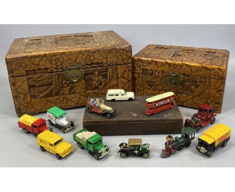 TWO CHINESE CAMPHOR WOOD TRINKET BOXES, carved decoration and brass lock plates, 31cms (w) the largest, with a small collecti