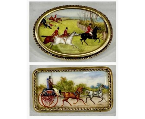 TWO VINTAGE HAND-PAINTED PORCELAIN BROOCHES, in gilded frames, rectangular coaching scene, 25 x 45mms, and oval fox hunting s