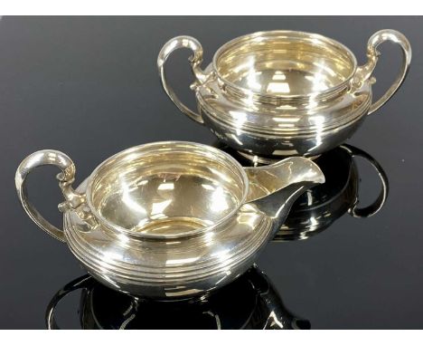 GEORGE V MILK JUG & SUGAR BASIN, plain circular form, Blackmore & Fletcher Ltd., London 1925, 15oztProvenance: private collec
