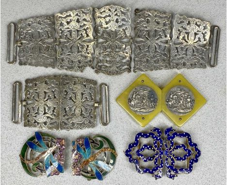 FOUR VINTAGE BELT BUCKLES, comprising Art Nouveau enamelled dragonfly buckle, blue enamelled polka-dot buckle, Art Deco cellu