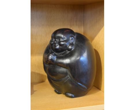 Ceramic figure of a Buddha, 22cm high   Condition: 