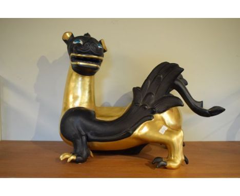 Modern ceramic figure of an oriental dragon decorated in black with gilt highlights   Condition: 
