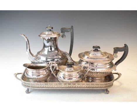 Silver plated four piece tea service having fluted decoration, together with a silver plated two handled tray   Condition: 
