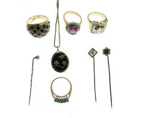 Diamond set stickpin in a square lattice setting, two other stickpins, four dress rings and a pendant on chain   Condition: 