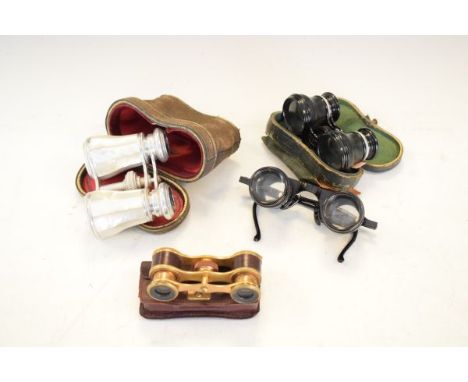 Four pairs of vintage opera glasses   Condition: 