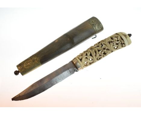 19th Century Indian dagger having a carved and pierced foliate design bone hilt and a nickel plated mounted horn scabbard   C