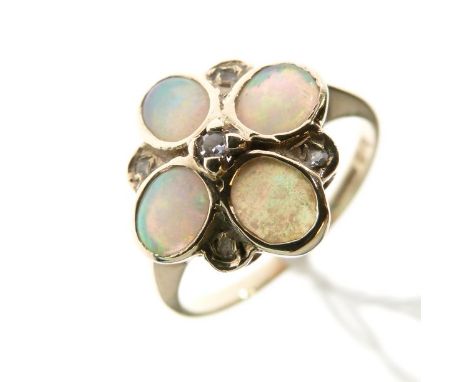 9ct gold opal and white stone dress ring in a flower design setting, size K   Condition: 