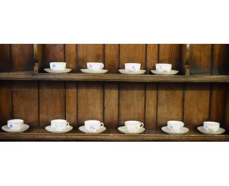 Ten Nymphenburg porcelain coffee cups and saucers, each having botanic decoration   Condition: 