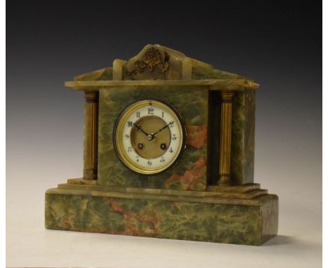 Late 19th Century French green onyx cased architectural style mantel clock, the brass dial having an off-white chapter ring w