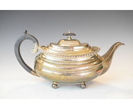 George V silver teapot having a gadrooned edge and standing on ball feet, Sheffield 1926, 22.1oz approx gross   Condition: 