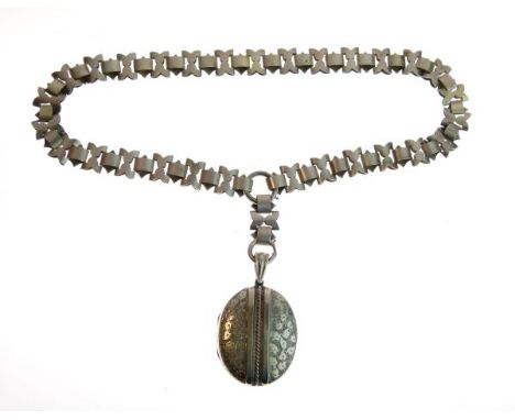 White metal oval locket on a fancy link chain   Condition: 